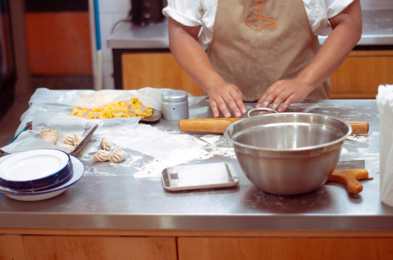 hand rolling dumplings